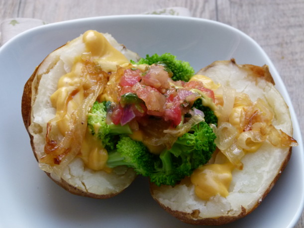 with vegan "cheese" sauce, broccoli, cooked onions and salsa | pamela salzman