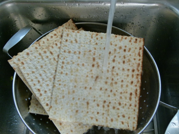 I like to soften the matzos a little by running some water over them.