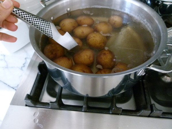 pierce potato with paring knife to determine doneness