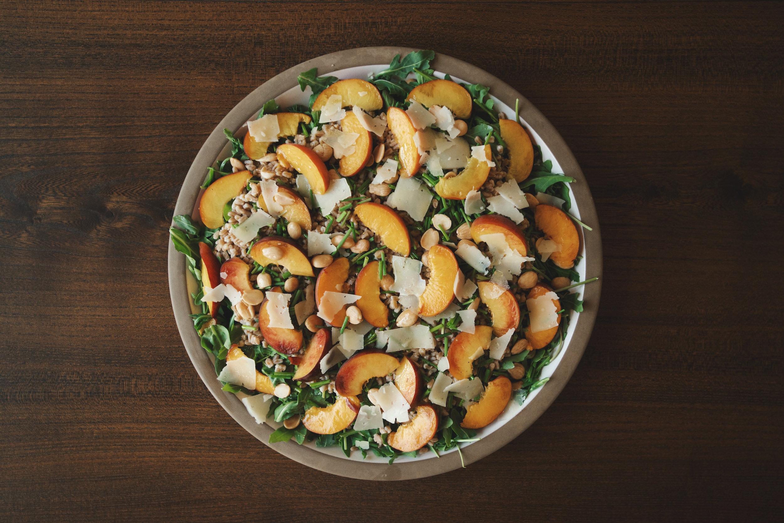 arugula and farro salad with peaches
