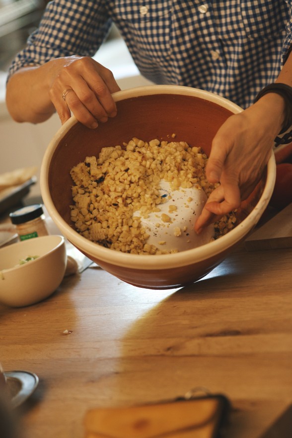 Invert a small bowl inside your serving bowl to cut corn