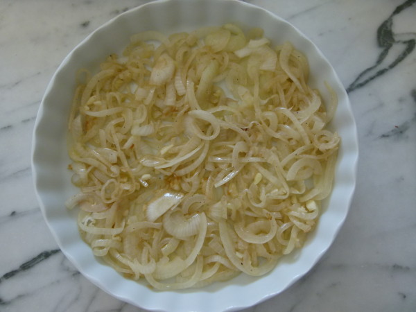 make a bed of sautéed onions and garlic