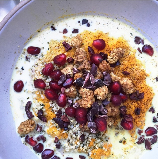 DIY gluten-free multigrain porridge with turmeric, vanilla powder, walnuts, pomegranate seeds, raw cacao nibs | pamela salzman