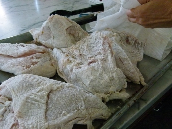 dredge the chicken lightly with flour