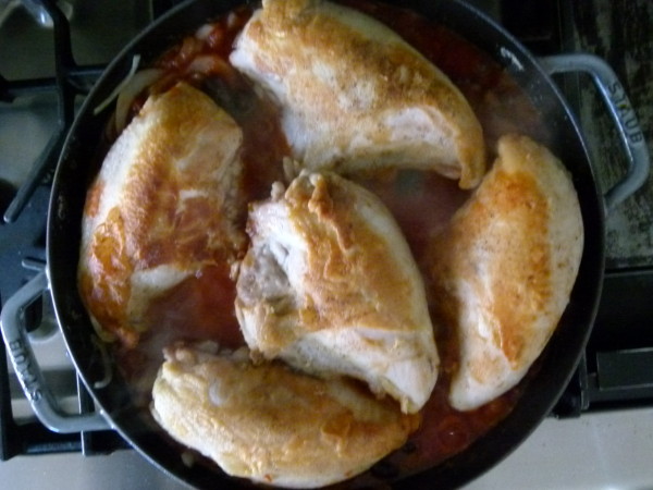 nestle chicken in the tomato mixture