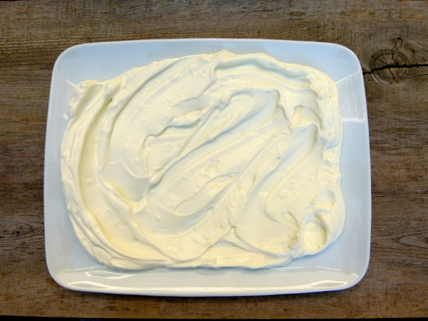 spread the garlic yogurt on platter