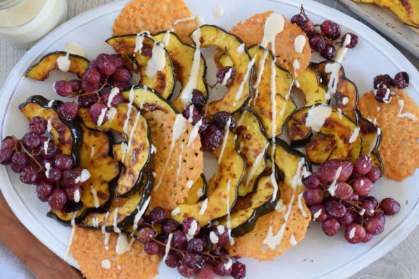 roasted acorn squash with roasted grapes, frico and pine nut dressing | pamela salzman