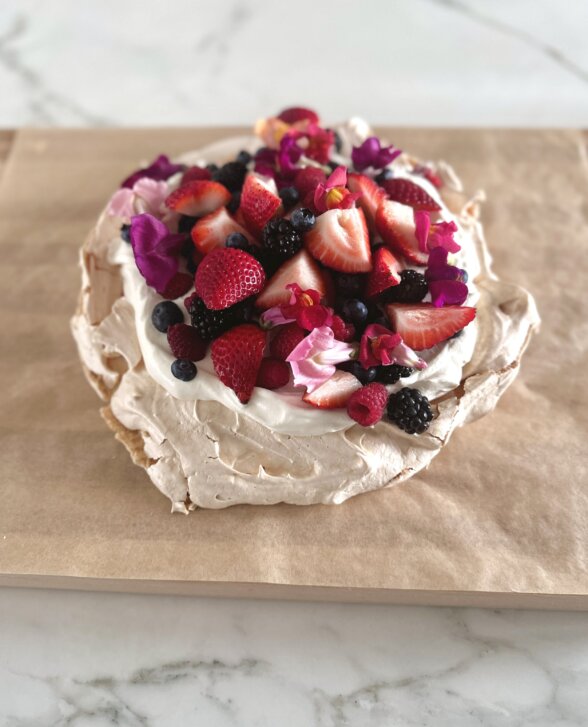 pavlova topped with berries