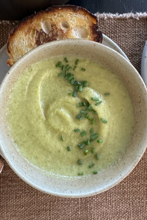 up close bowl of broccoli stalk soup