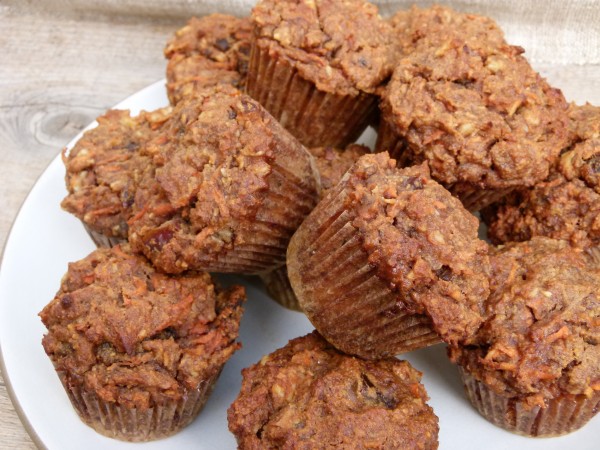 banana carrot muffins on a white plate