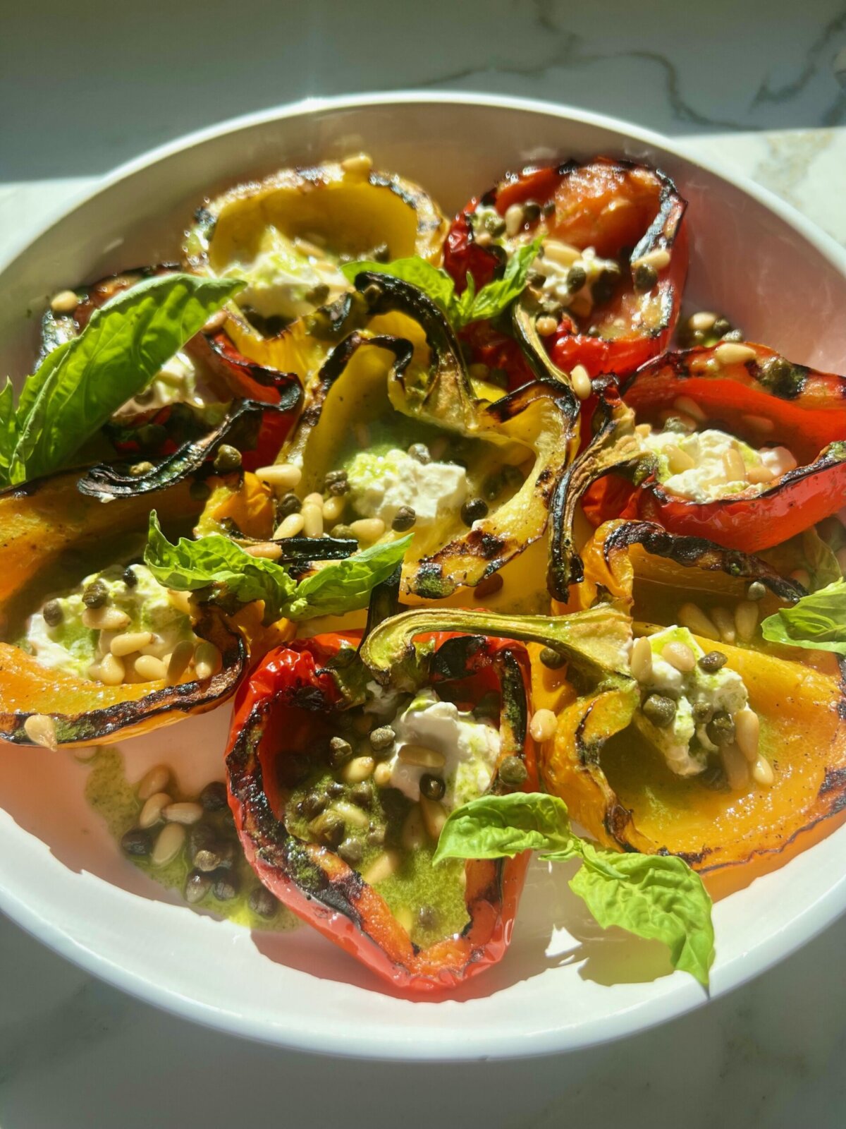 grilled bell peppers on a white plate