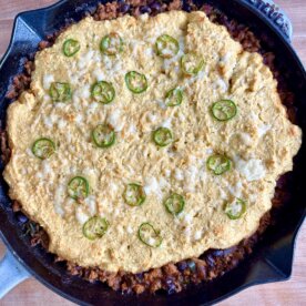 a tamale pie in a skillet