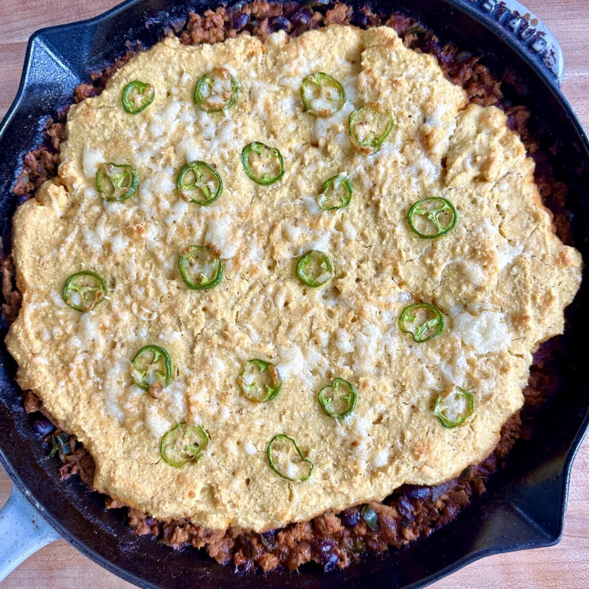 a tamale pie in a skillet