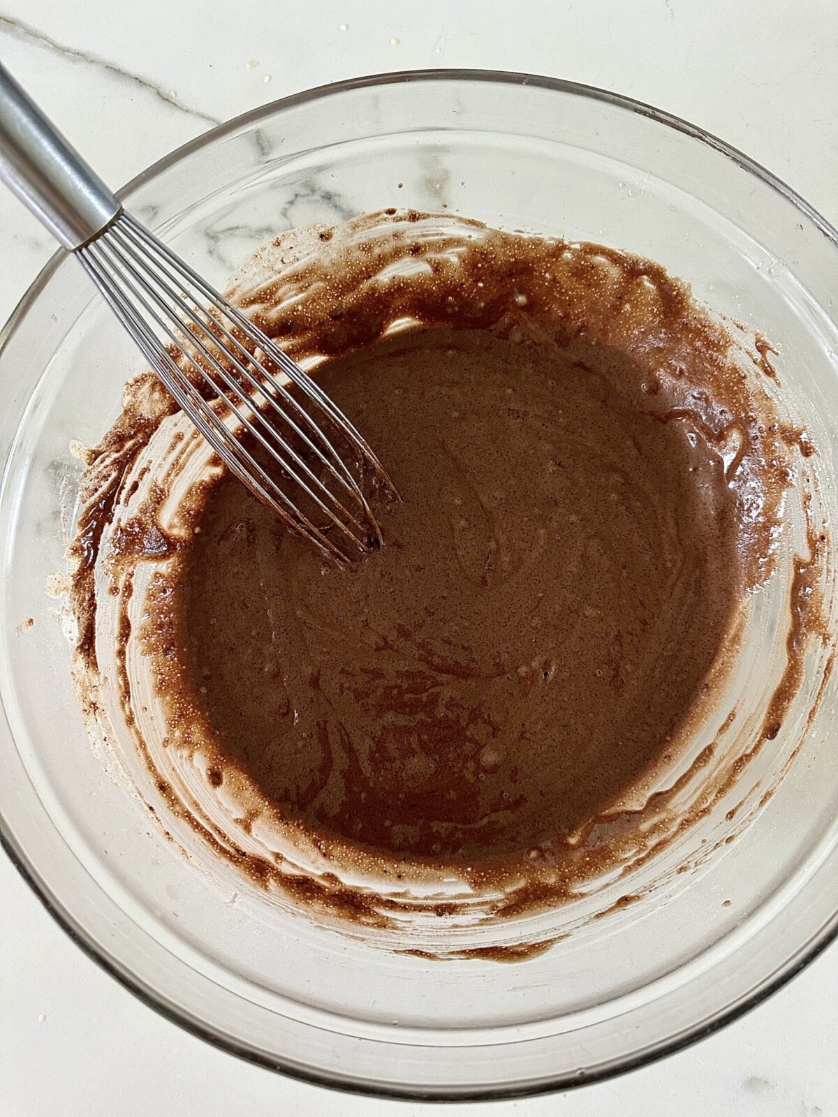 wet and dry ingredients mixed together in a bowl