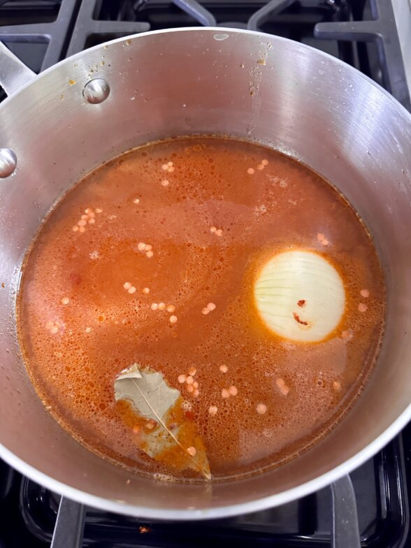 broth and ingredients in a soup pot