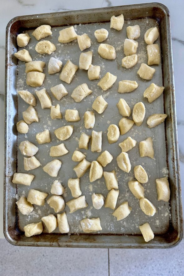 gnocchi dumplings on a sheet pan. 