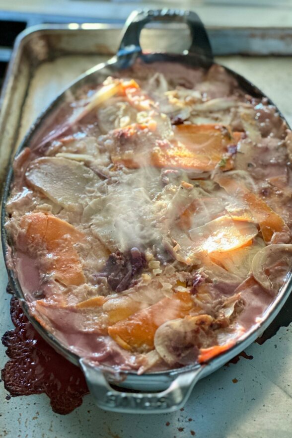 vegetables cooked in cream sauce coming out of the oven 