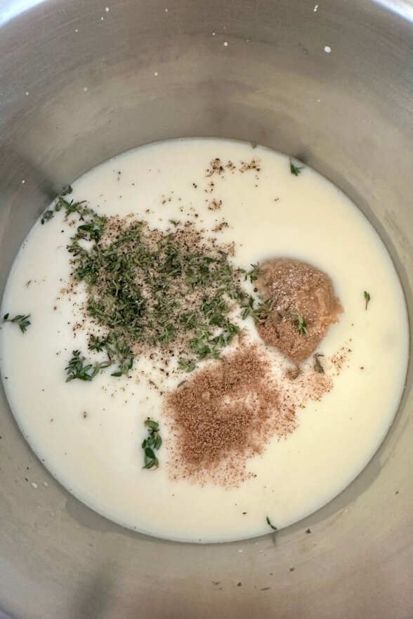 cream and seasonings in a mixing bowl 