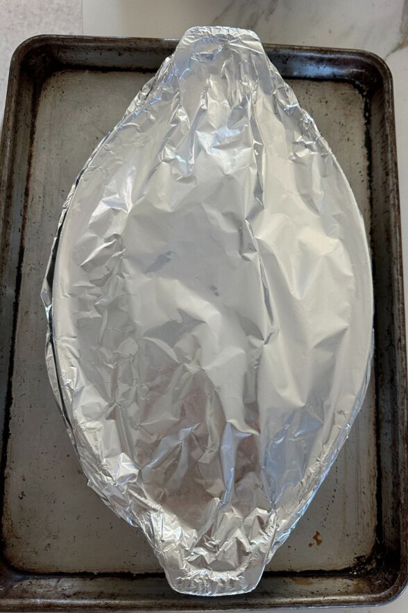 foil covering the top of a baking dish 