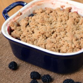 a baked apple blackberry crumble out of the oven