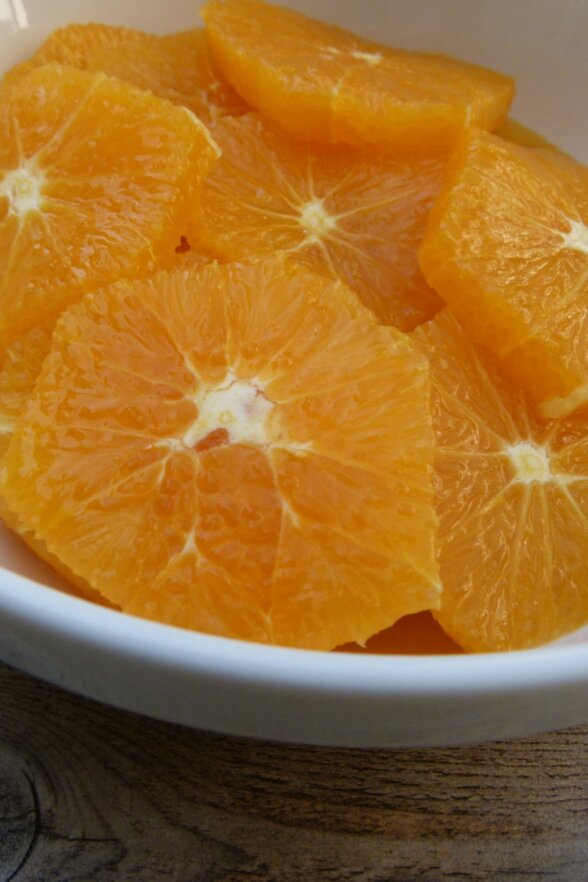 bowl of cut up oranges