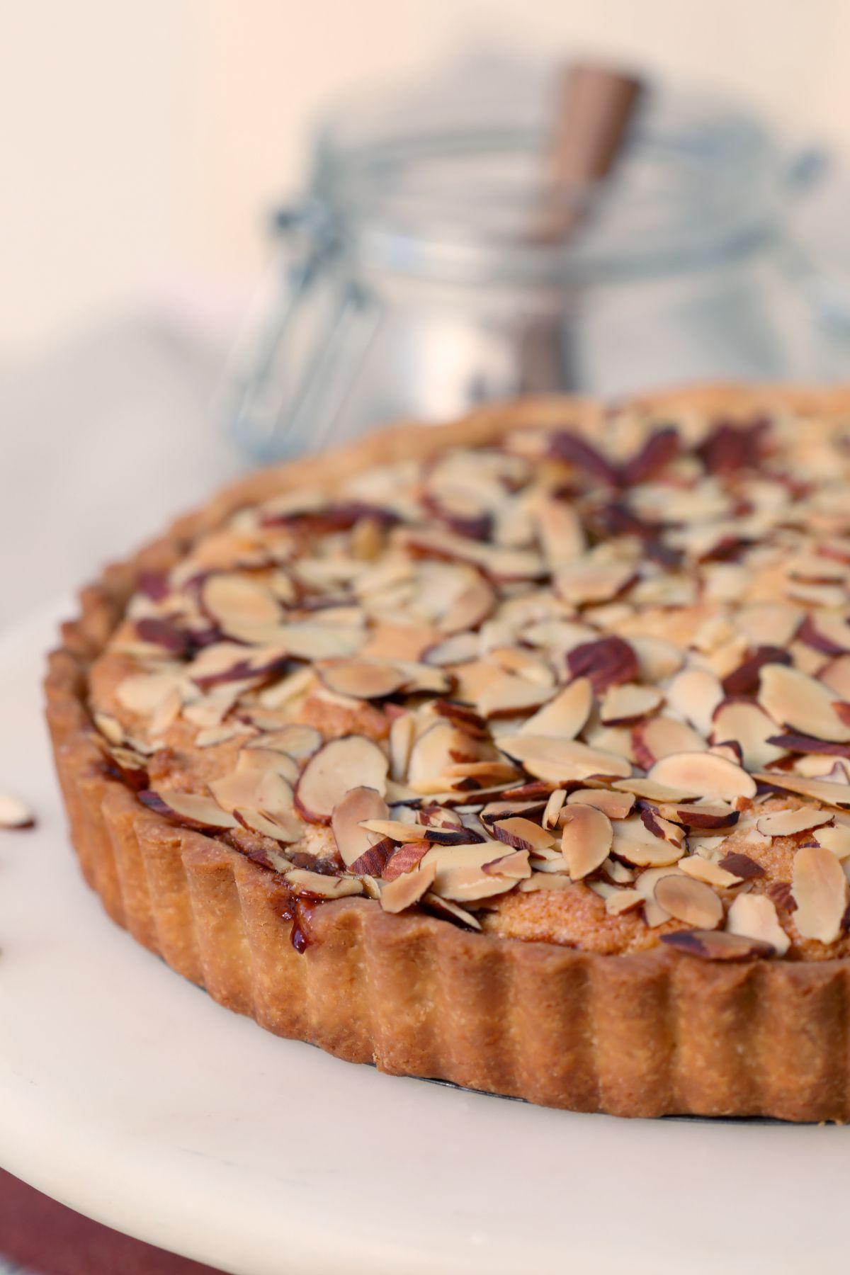 half of a cherry bakewell tart