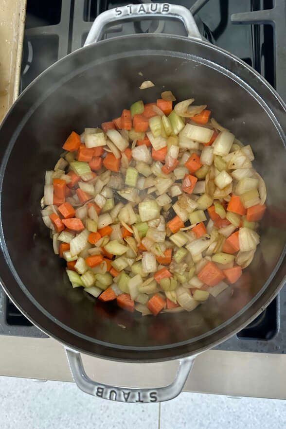 veggies sauteeing in a pot