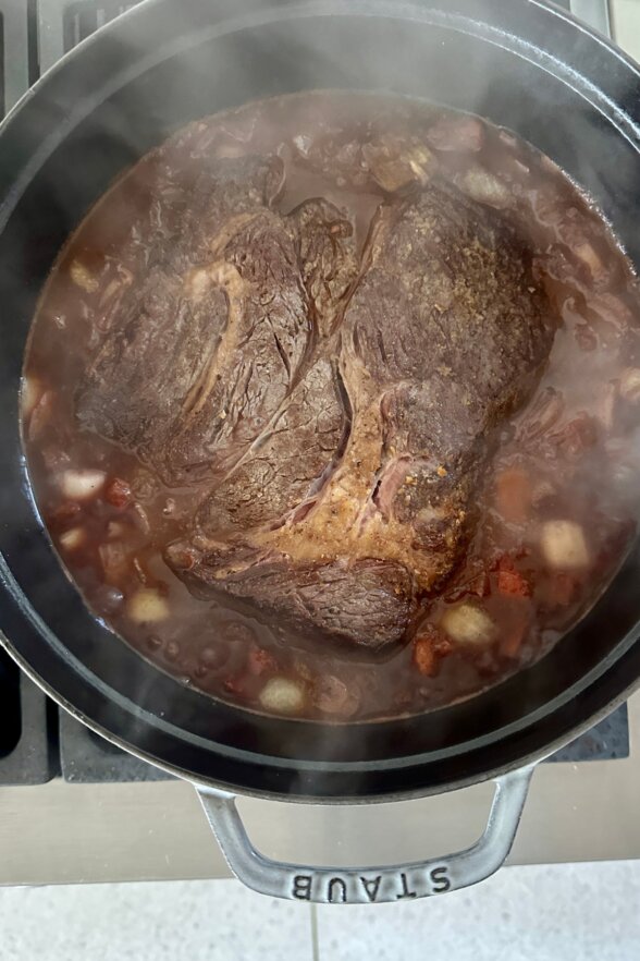 beef in a red wine sauce and veggies