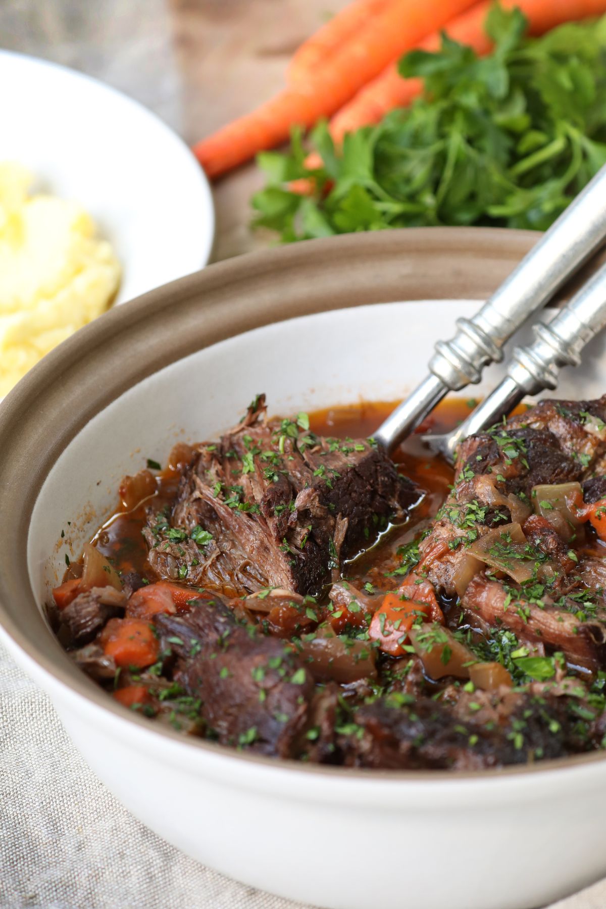 a serving dish filled with stracotto di manzo