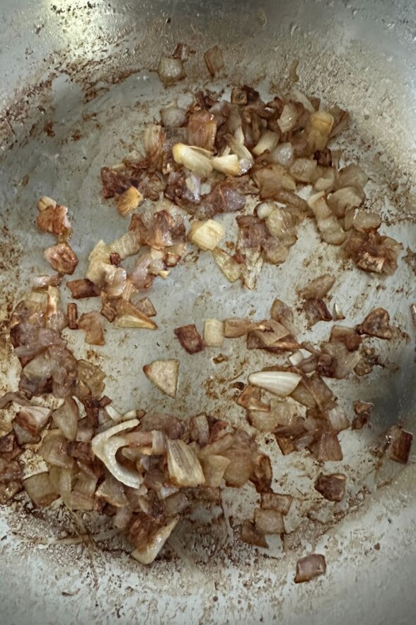 shallots in a frying pan