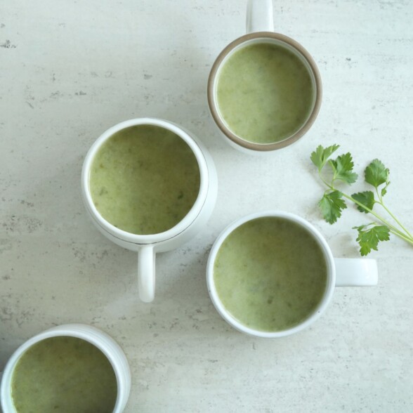 four cups filled with super green soup