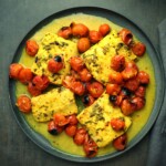 coconut fish and tomato bake on a serving platter