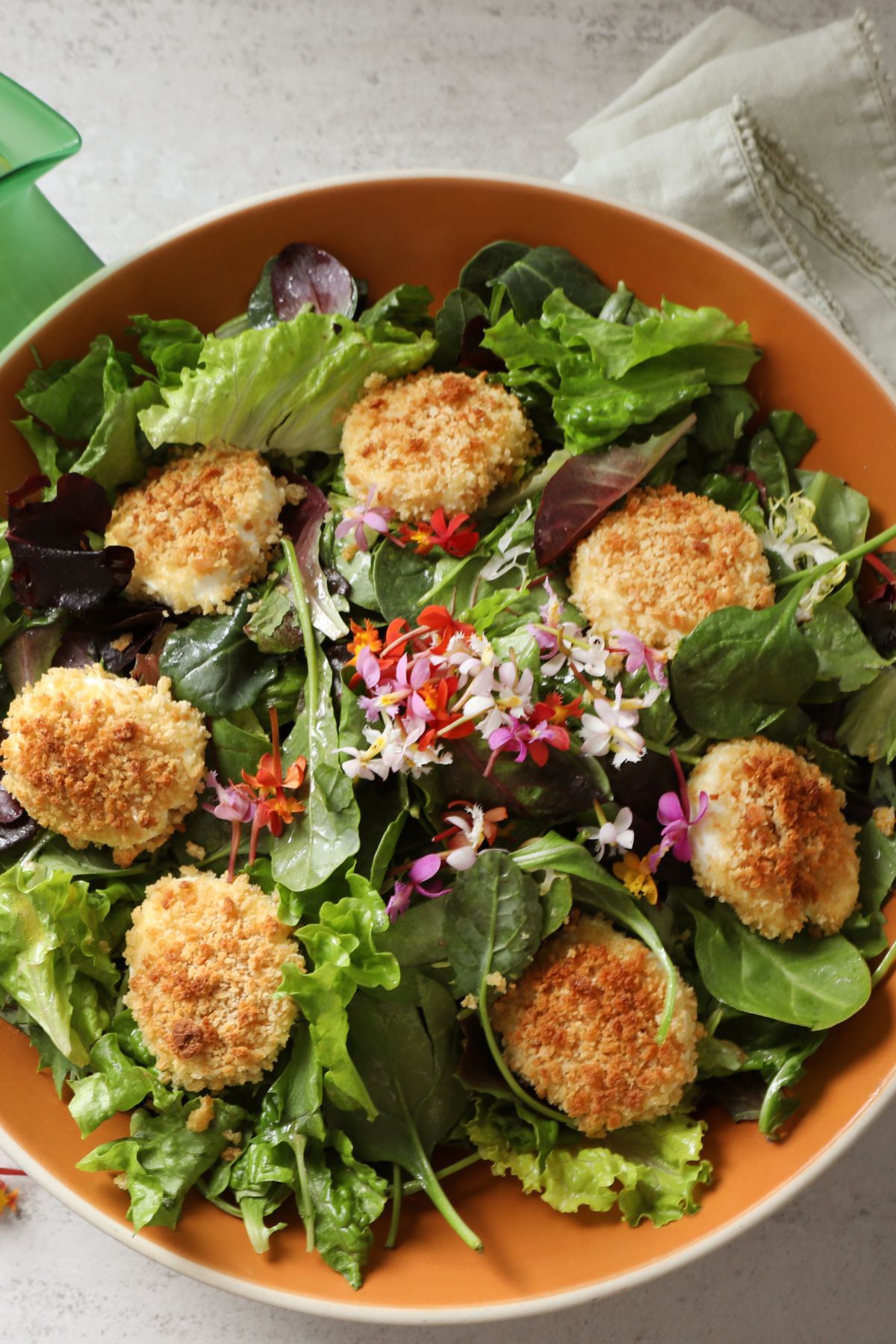 baked goat cheese salad in a bowl 