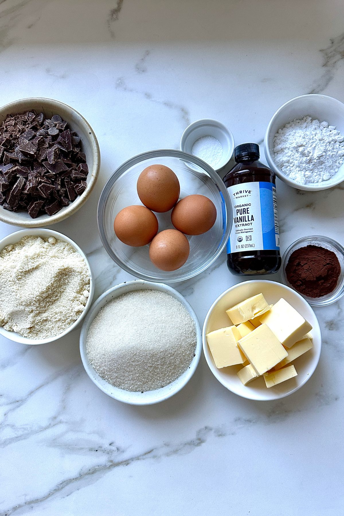 recipe ingredients in small bowls on a counter