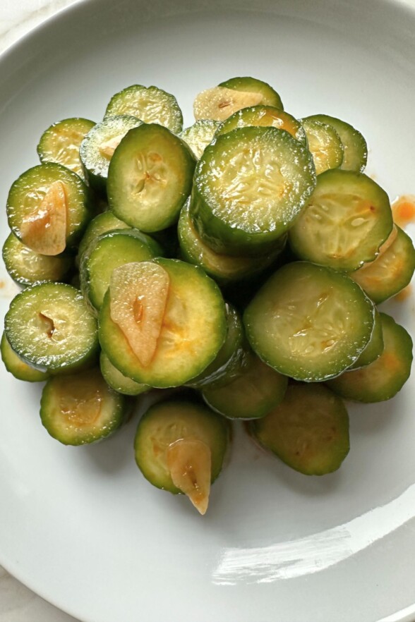 Stacked cucumber salad arranged in a shallow bowl, just like at Din Tai Fung.