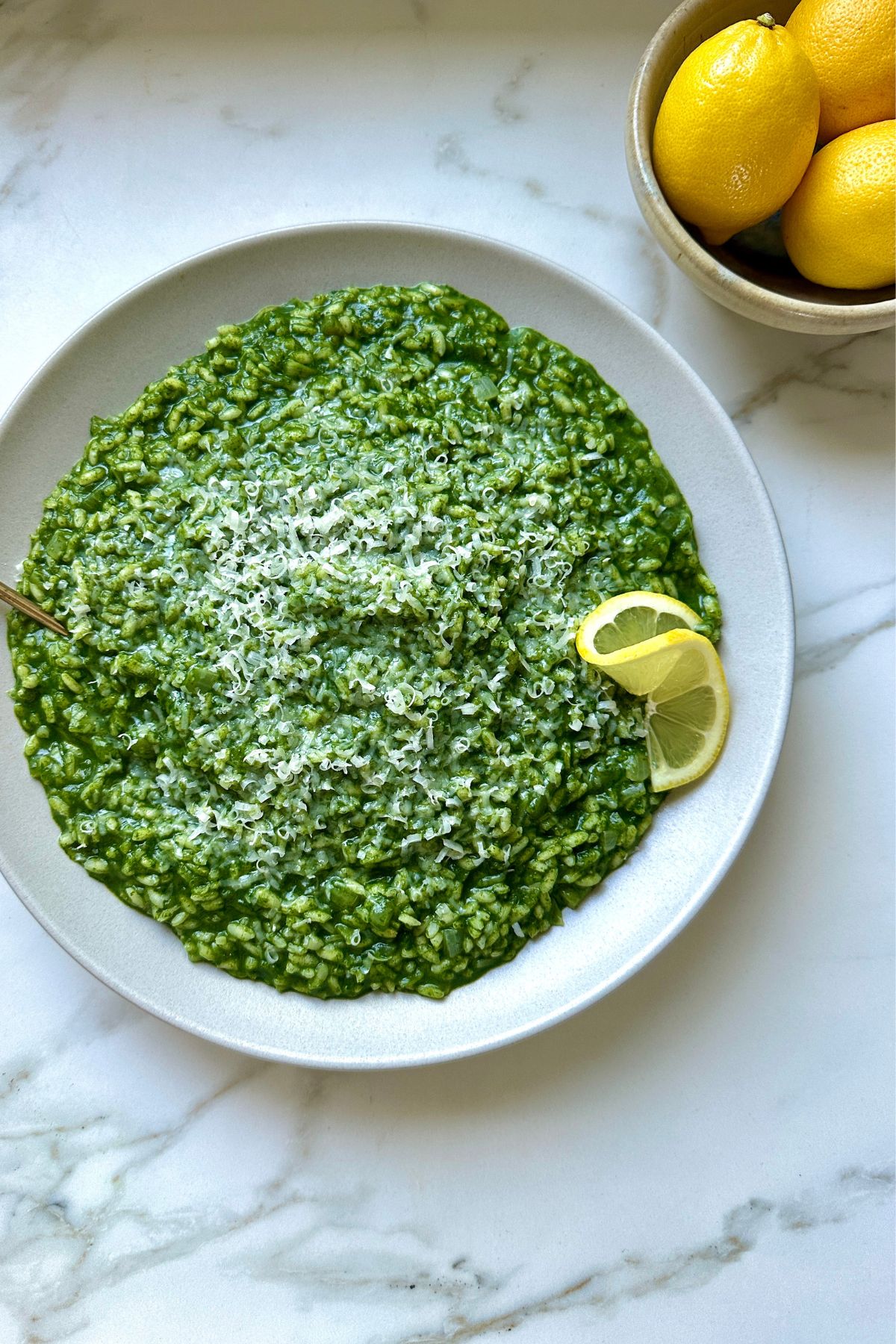 arborio rice cooked with spinach and broth to make spinach risotto