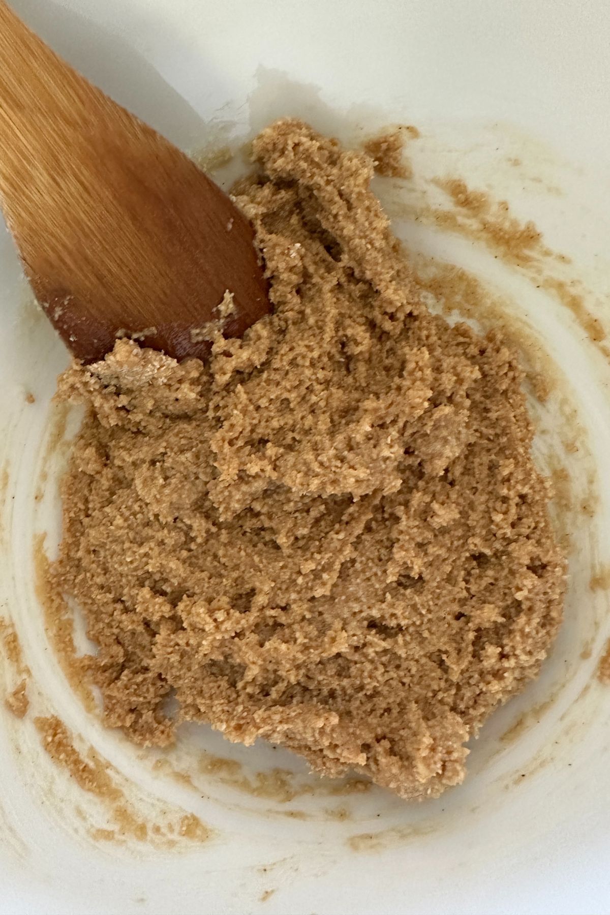 Mixing bowl with peanut butter cookie dough ready to portion for Nutter Butter cookies