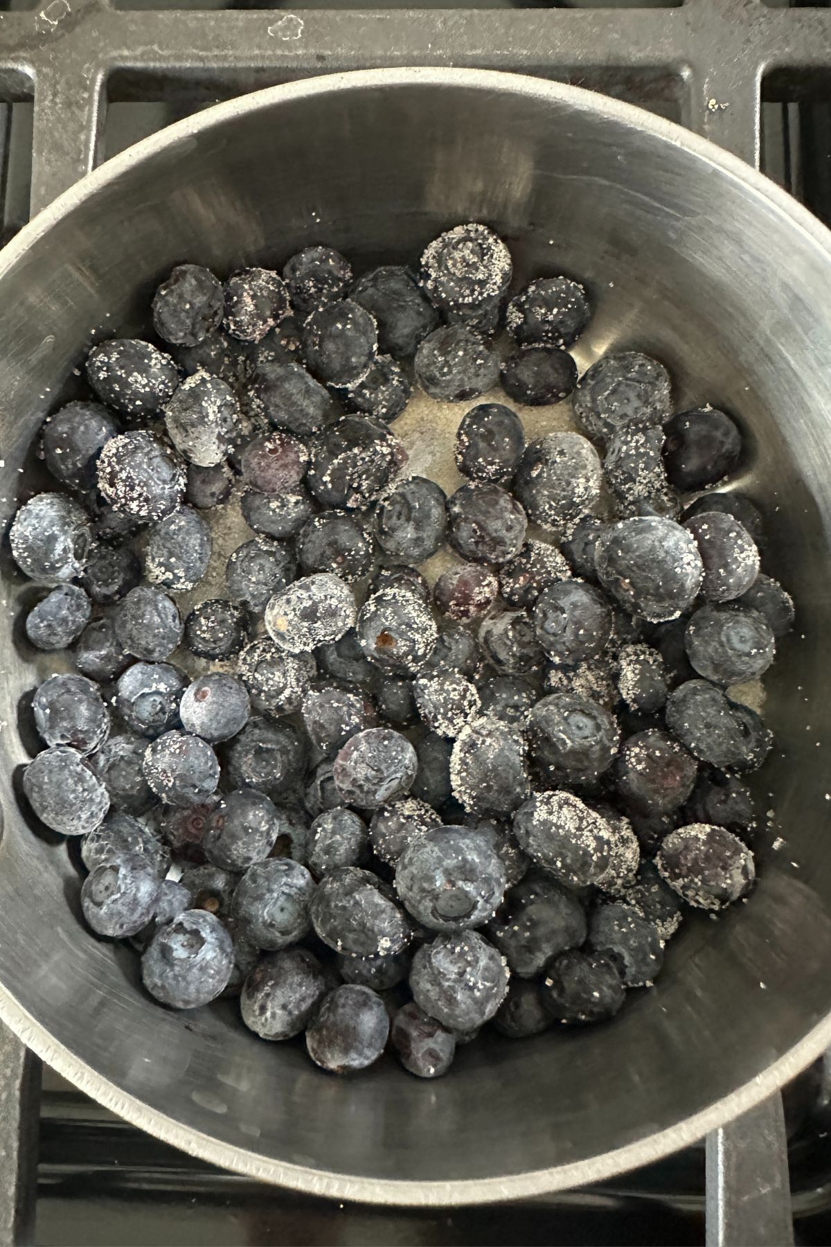 blueberries in a bowl of sugar