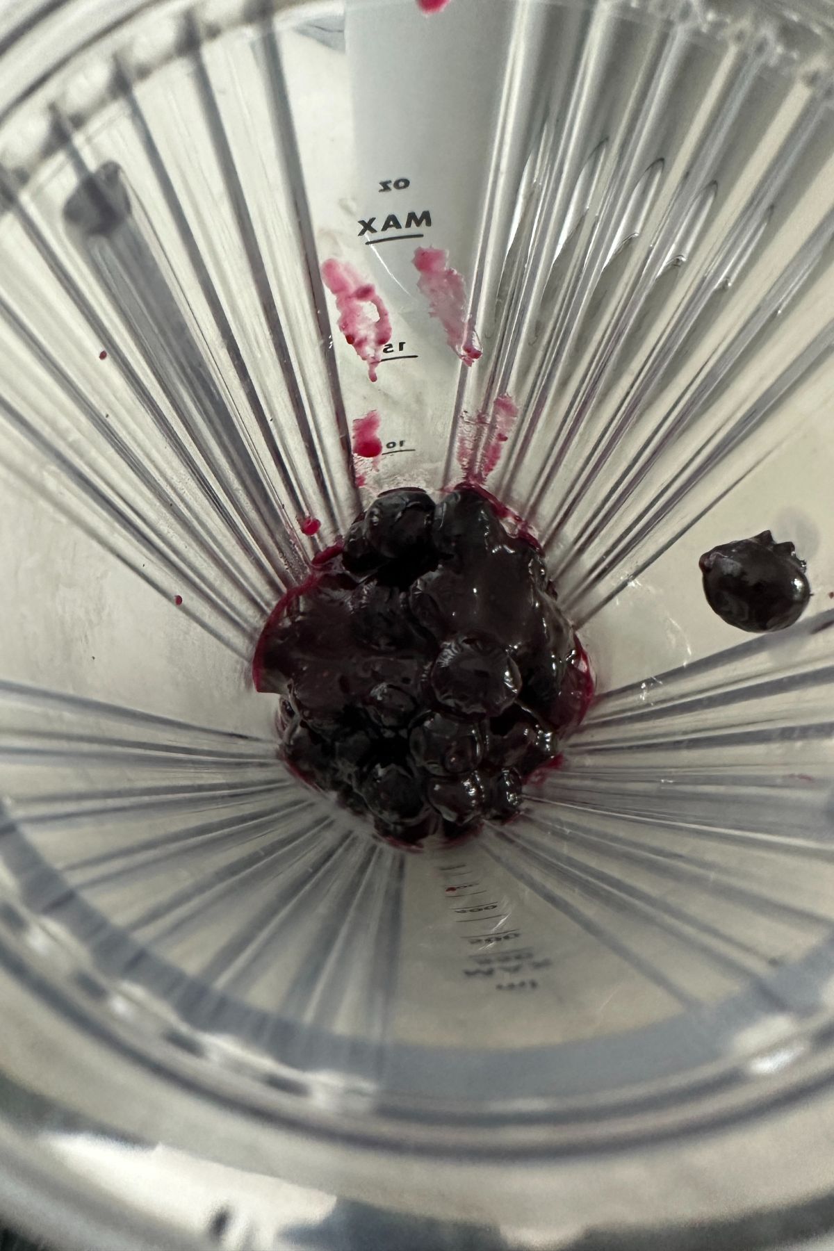 a blender filled with the blueberry swirl ingredients