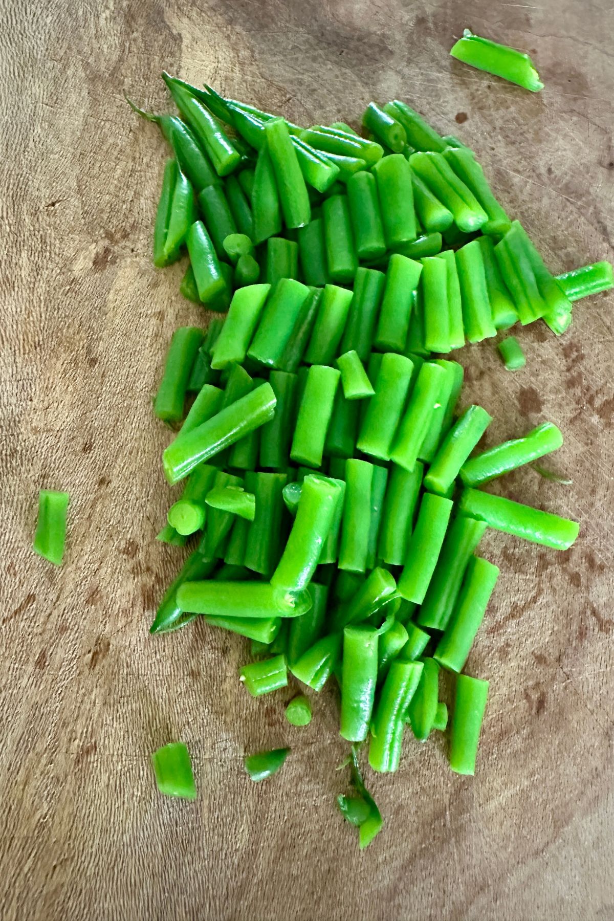 green beans cut and ready to be blanched before adding to the salad