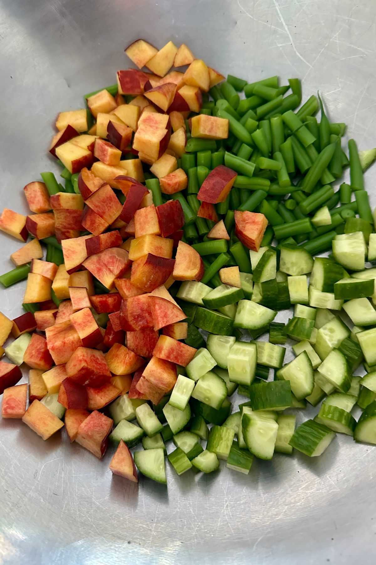 salad ingredients ready to be tossed together with the dressing 
