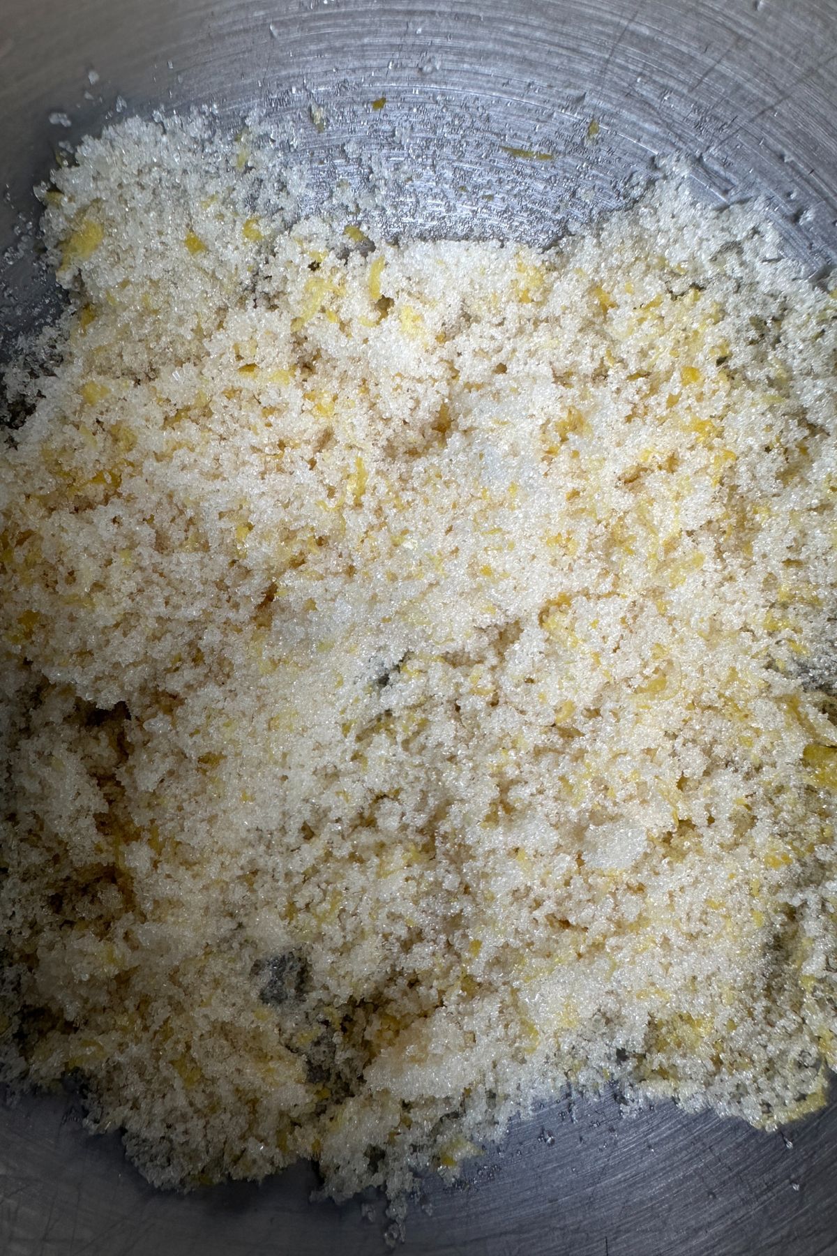 Butter and lemon sugar mixture being creamed until light and fluffy
