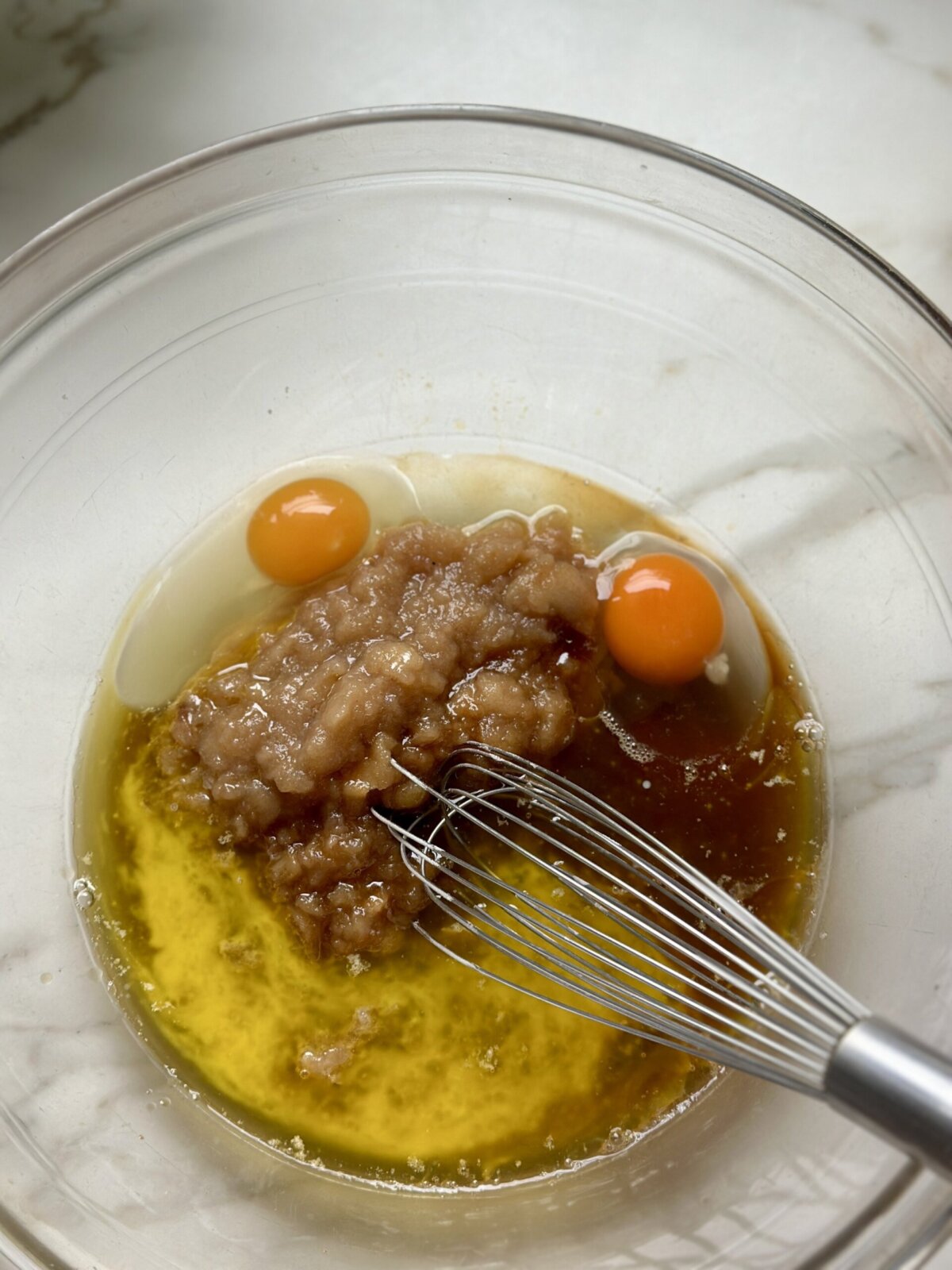 wet ingredients in a glass bowl