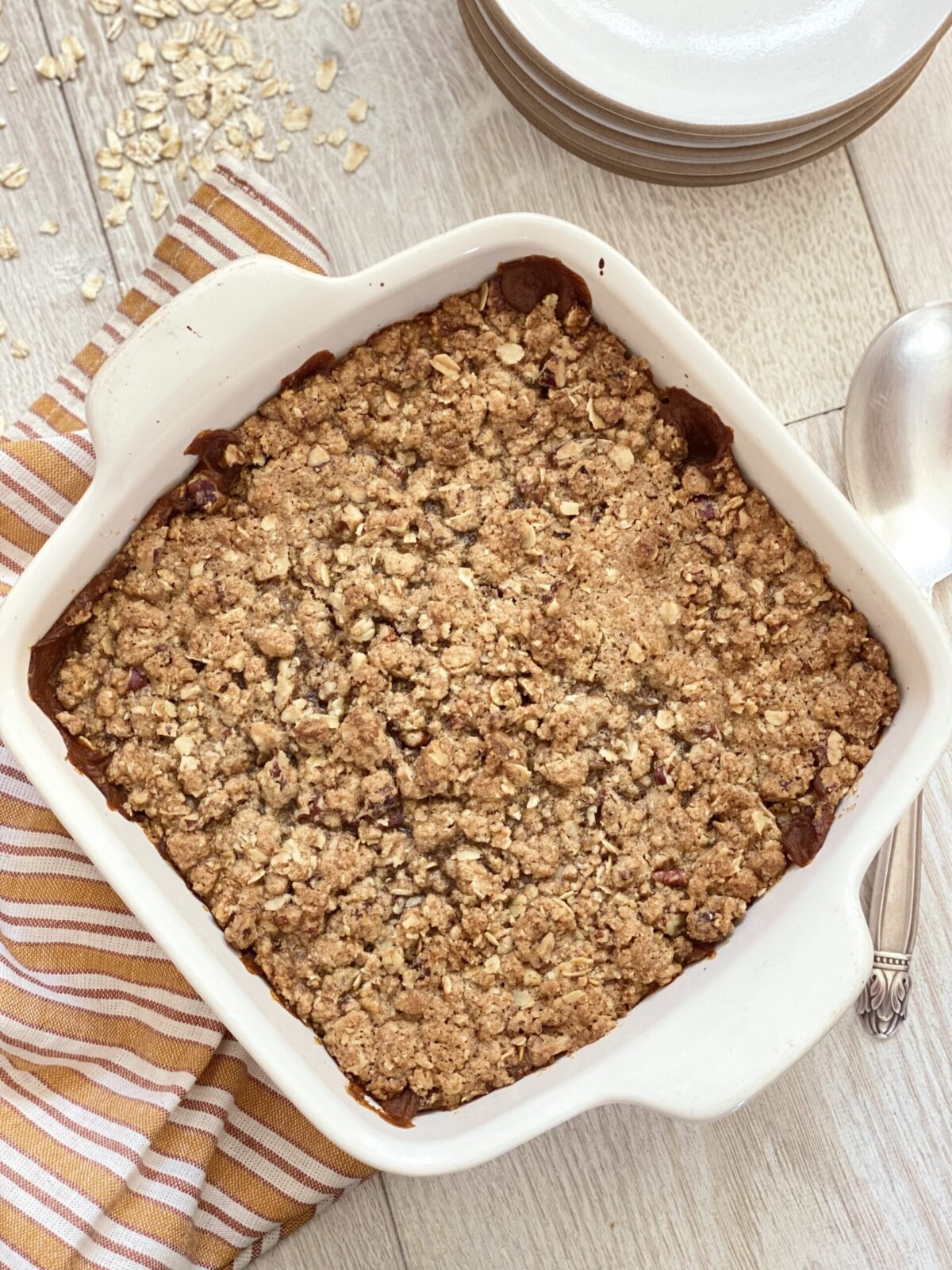 a pumpkin crisp in a square baking pan